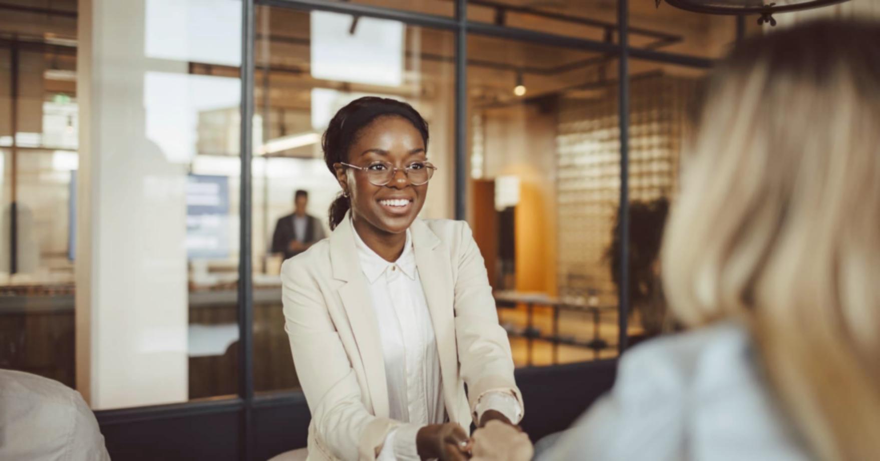 Business team reviewing financial forecasts and growth projections on computer screens